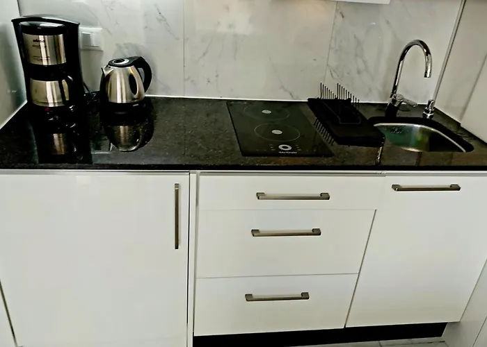 Under The Palm Playa de las Americas (Tenerife)